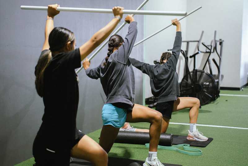 Young athletes training together in a small-group performance session in San Diego