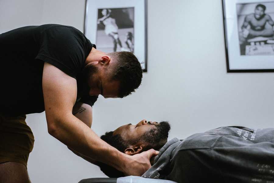 Doctor of Physical Therapy performing hands-on manual therapy in San Diego